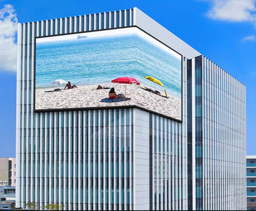 Corner-wrap outdoor LED facade — brightness over ultra-fine resolution